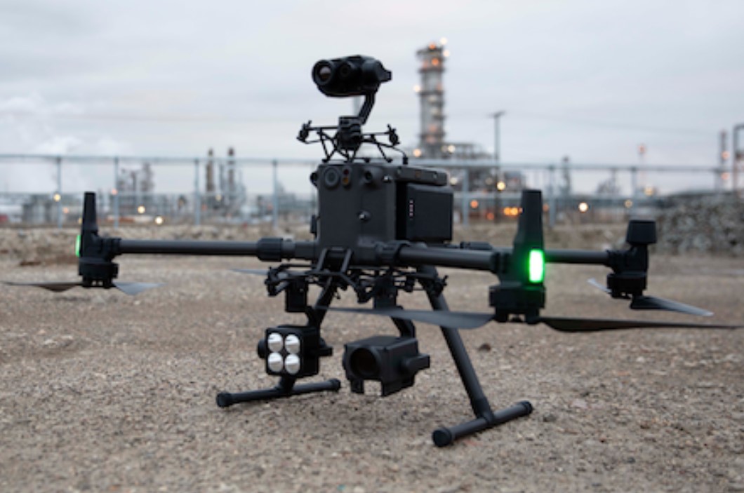 DJI M300 RTK inspection drone equipped with three cameras at an industrial site